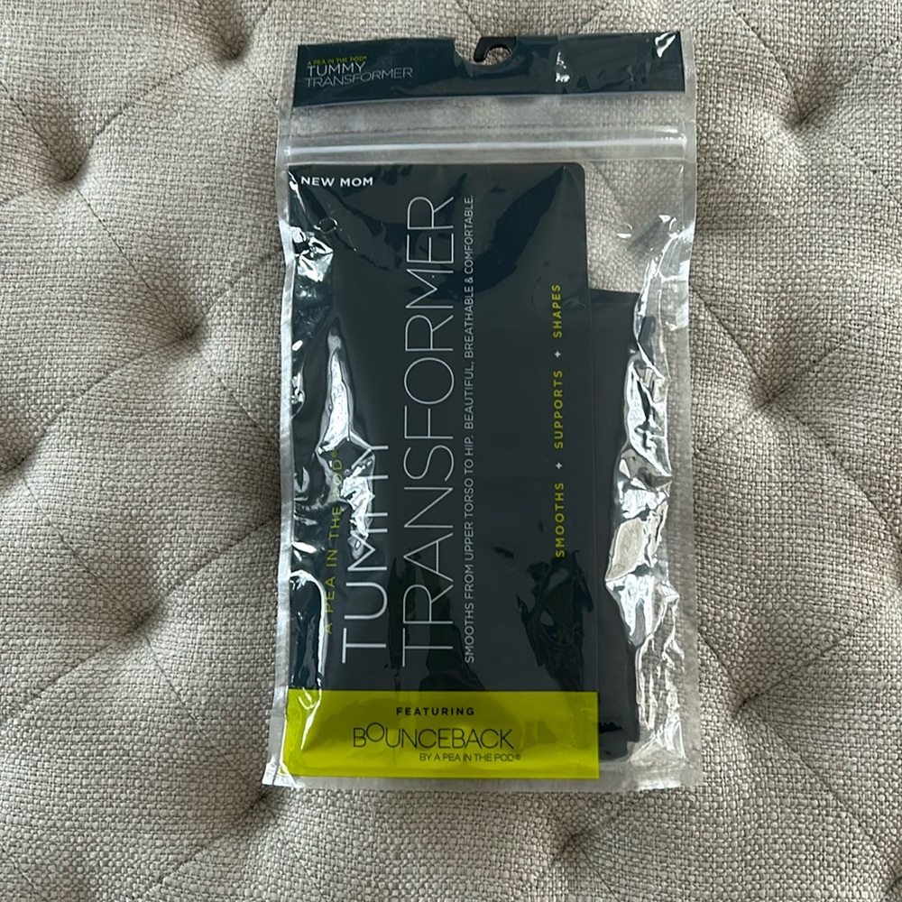 A Pea In The Pod Tummy Transformer. Black, Large. New, never worn.